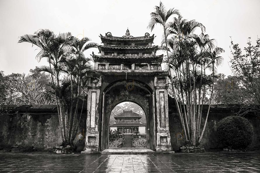 Hoang Trach gate, an ancient gate of tomb of Emperor Minh Mang with a view of Minh Lau pavilion.